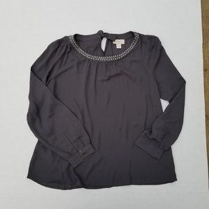Gray blouse with beading around the collar